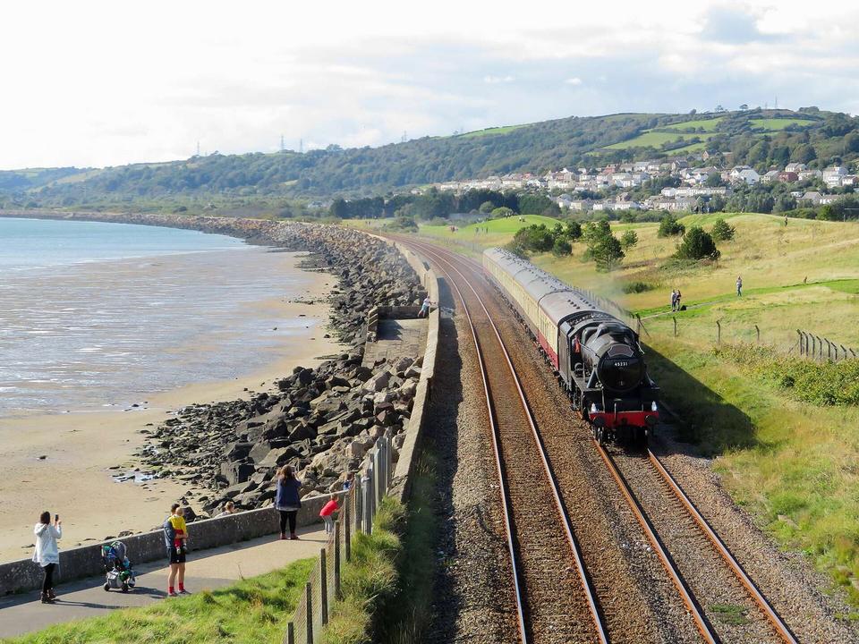 Black 5 near Pwll. Ex-LMS 'Black 5' No. 45231 passes Cefn Padrig near the mouth of the River Loughor, between Burry Port and Llanelli with the return leg of Pathfinder Tours' Sugar Loaf Mountaineer II