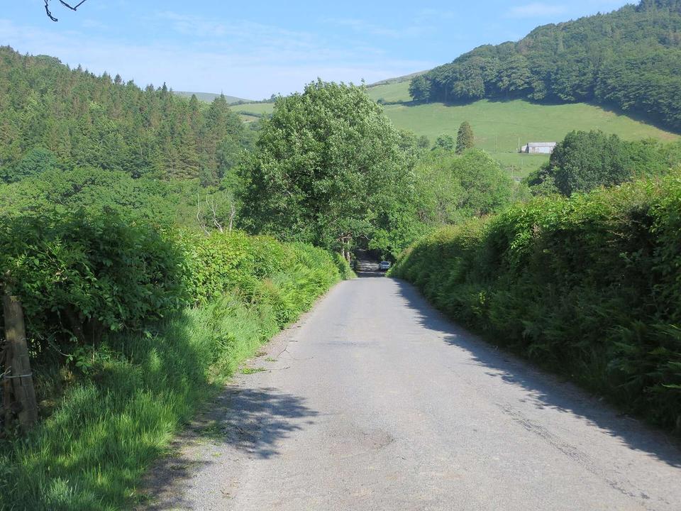 Road (B4574) descending to Pont Peiran