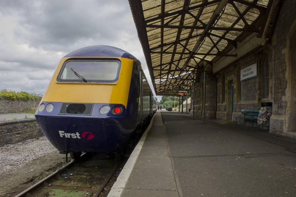 Great Western Railway's 1B15 0845 service from London Paddington stands at Pembroke Dock, shortly after arrival on Saturday 23rd July 2016. Power car 43040 is nearest the camera. The train will return