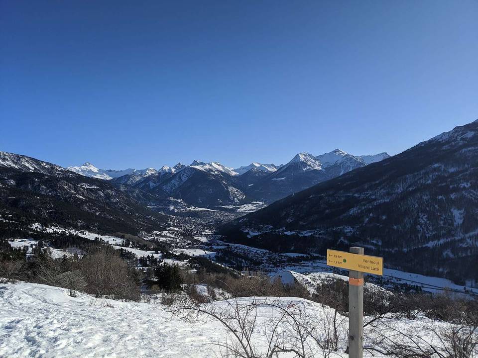 Picture overlooking the valley of Saint-Chaffrey and Briançon from high up on the Col du Granon in Winter