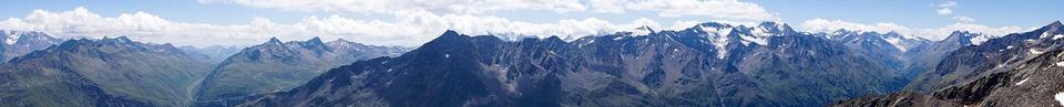 A panoramic view of the Stubaier Alps and the road towards the Timmelsjoch (left), and the Ötztaler Alps (right) with the Ramolkogel.
